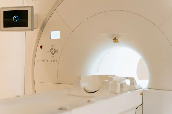 The bore of a scanner with positioning pads on the patient table